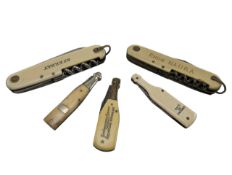 FIVE VINTAGE 20TH CENTURY ADVERTISING IVORINE / BAKELITE PENKNIVES & CORKSCREWS, THREE BOTTLES