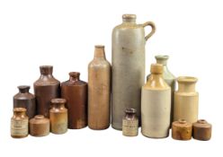 COLLECTION OF STONEWARE ADVERTISING BOTTLES, JUGS & BUD VASES INCL. DOULTON LAMBETH EXAMPLES