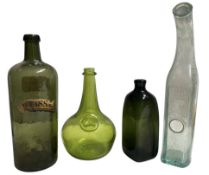 FOUR 19TH CENTURY & LATER WINE & GIN BOTTLES, ONE WITH ORIG. LABEL