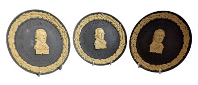 GUINNESS INTEREST. THREE COMMEMORATIVE 1984 ANNIVERSARY JASPERWARE PLATES BY WEDGWOOD