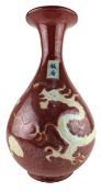 CHINESE IRON RED AND WHITE YUHUCHUN VASE 红釉留白龙纹玉壶春瓶
