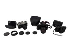 COLLECTION OF THREE LATE 20TH CENTURY VINTAGE SLR CAMERAS