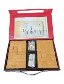 LATE 20TH CENTURY CHINESE MAHJONG SET IN BLACK CASE