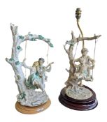 CAPODIMONTE - TWO LATE 20TH CENTURY RESIN SWING SCULPTURES