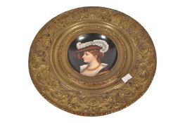 20TH CENTURY BRASS EFFECT CHARGER W/ CENTRAL PAINTED PORCELAIN PLATE