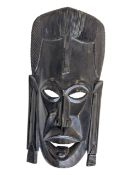 MID CENTURY HAND CARVED DARK WOOD AFRICAN MASK