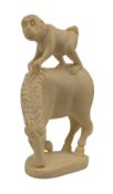 20TH CENTURY JAPANESE IVORY NUT CARVING FIGURE OF A MONKEY ON HORSEBACK