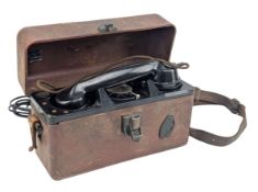 A CASED 1960S BAKELITE LINESMAN FIELD TEST TELEPHONE