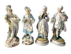 TWO PAIRS OF CONTINENTAL 19TH CENTURY BISQUE FIGURINES T/W ANOTHER PAIR (4)