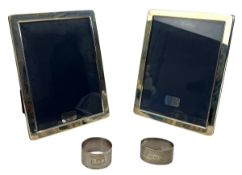 PAIR OF HALLMARKED SILVER PHOTO FRAMES BY MAPPIN & WEBB & TWO SILVER NAPKIN RINGS