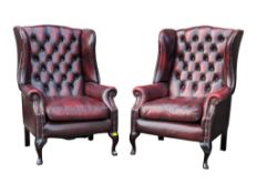 PAIR OF OXBLOOD LEATHER BUTTON BACK QUEEN ANNE WING BACK ARMCHAIRS