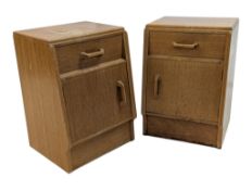 ERNEST GOMME FOR G-PLAN FURNITURE - PAIR OF OAK BEDSIDE CABINETS