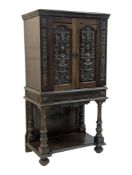 19TH CENTURY VICTORIAN CARVED FRONT MAHOGANY CABINET ON STAND