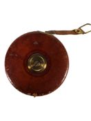 JOHN RABONE & SONS, BIRMINGHAM - MID CENTURY LEATHER CASED TAPE MEASURE