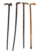 COLLECTION OF FOUR VINTAGE 20TH CENTURY ANIMAL WALKING STICKS