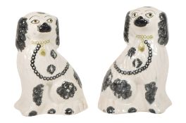 PAIR OF 19TH CENTURY STAFFORDSHIRE CERAMIC FIRESIDE MANTEL DOGS
