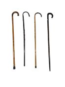 COLLECTION OF FOUR SHEPHERD'S CROOK WALKING STICKS