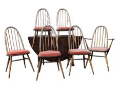 ERCOL FURNITURE - CIRCULAR DINING TABLE AND SIX WINDSOR MODEL 365 CHAIRS
