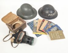 COLLECTION OF SECOND WORLD WAR HELMETS & BOOKS