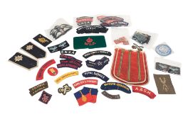 COLLECTION OF ASSORTED MILITARY UNIFORM CLOTH PATCHES