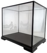 MID TO LATE 20TH CENTURY EBONISED AND GLASS CASED CABINET