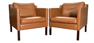 STOUBY - PAIR OF DANISH DESIGNER TAN LEATHER ARMCHAIRS