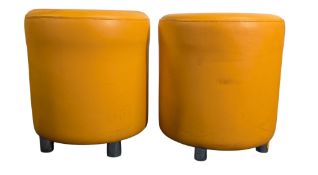 PAIR OF LATER 20TH CENTURY ORANGE FAUX LEATHER BARREL STOOLS