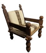 20TH CENTURY HAND-CARVED AFRICAN ARMCHAIR