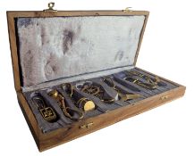 20TH CENTURY SET OF CASED BRASS NAUTICAL KEYRINGS