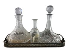 TWO CRYSTAL DECANTERS AND SILVER PLATED TWIN HANDLED TRAY