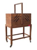 BRITISH MODERN DESIGN - MID CENTURY OAK CANTILEVER SEWING BOX ON STAND