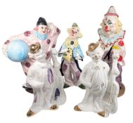 COLLECTION OF LARGE PORCELAIN CLOWN FIGURES