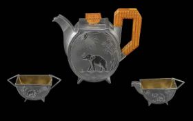 An Art Deco Three Piece Silver Tea Servi