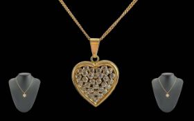 Ladies - Attractive 18ct Gold Diamond Set Heart Pendant Attached to a 18ct Gold Chain. Both