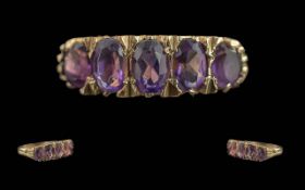 Ladies Attractive 9ct Gold 5 Stone Amethyst Set Ring with Ornate Raised Setting. The Well Matched