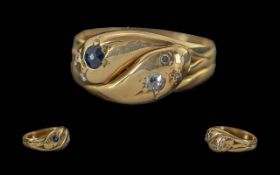 Ladies Pleasing 18ct Gold Double Headed Snake Ring Set with Diamond Eyes and Sapphires to Top of