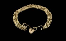 Ladies Pleasing Quality 9ct Gold Ornate Weave Design Bracelet with 9ct Heart Shaped Padlock, Fully