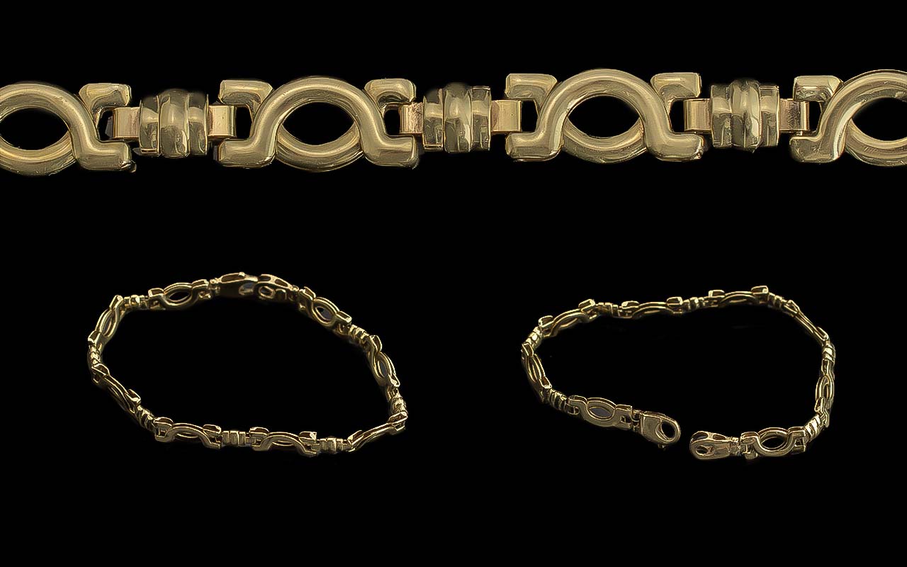 A Pleasing 9ct Gold Fancy Link Design Bracelet. Marked 9ct - 9.375, With Lobster Claw Clasp.