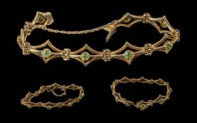 Antique Period Ladies Well Designed 9ct Gold Peridot Set Bracelet with Safety Chain, Marked 9ct. The