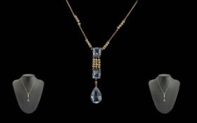 Ladies Attractive and Stylish 9ct Gold Aquamarine and Pearl Set Necklace with Drop. Marked 9ct.