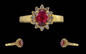 Ladies 18ct Gold Ruby and Diamond Set Dress Ring, Marked 750 - 18ct to Interior of Shank. The
