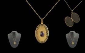 Ladies - Pleasing 9ct Gold Amethyst Set Hinged Locket of Oval Form, Attached to a 9ct Gold Fancy