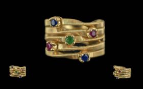 Marco Bicego Signed 18 carat gold Gem Set Fashion Ring marked 750. Set with emeralds, rubies and
