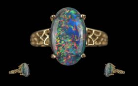 Ladies Attractive 9ct Gold Single Stone Opal Set Ring Open worked shoulders marked 9ct to interior