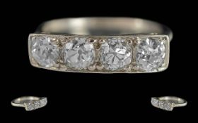 Ladies 18ct White Gold Four Stone Diamond Set Ring. Not marked, tests high carat gold 18ct.
