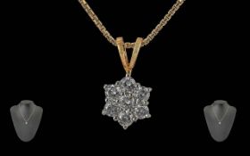 Ladies Excellent Quality 18ct Gold Diamond Set Pendant Attached to a 9ct Gold Chain. The Well