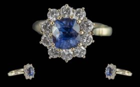 Ladies Attractive 18ct White Gold Sapphire And Diamond Cluster Ring.