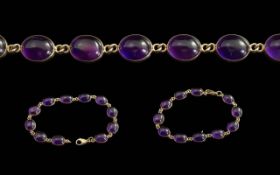 Ladies Pleasing 9ct Gold Amethyst Set Bracelet, Marked 9ct. The Well Matched Cabouchon Cut