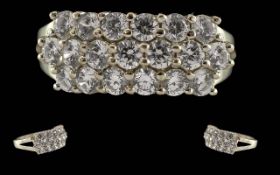 Ladies 18ct White Gold Contemporary Triple Row Diamond Set Ring. Marked 18ct to Interior of Shank.