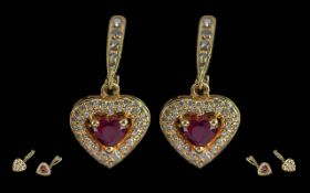 Ladies - Excellent Quality Pair of 18ct Gold Heart Shaped Ruby and Diamond Set Earrings. Marked 18ct